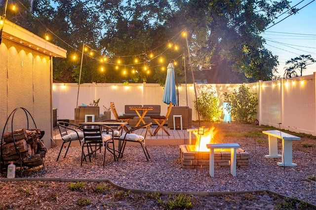 3245 Freemont Ter S, Saint Petersburg, FL 33712 - view of patio / terrace with an outdoor fire pit and a fenced backyard
