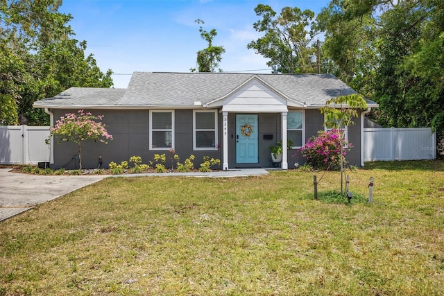 3245 Freemont Ter S, Saint Petersburg, FL 33712 - view of front facade with a gate and roof with shingles