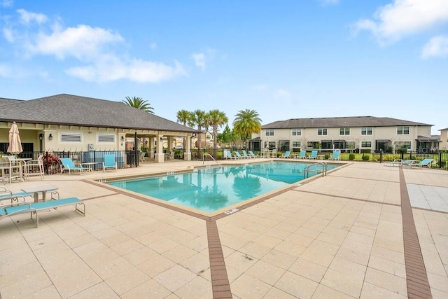 29901 Southwell Ln, Wesley Chapel, FL 33543 - community pool with a patio and fence