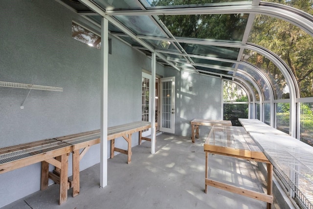 12002 Hope Ln, Tampa, FL 33618 - unfurnished sunroom featuring outdoor dining area