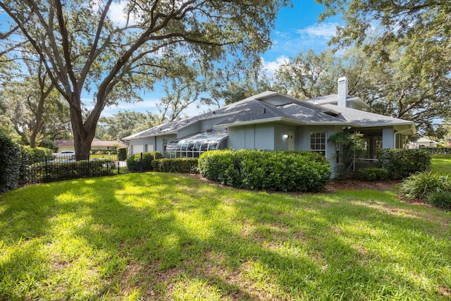 12002 Hope Ln, Tampa, FL 33618 - view of property exterior featuring a chimney