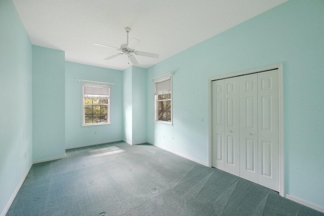 12002 Hope Ln, Tampa, FL 33618 - unfurnished bedroom featuring carpet floors, a closet, and baseboards