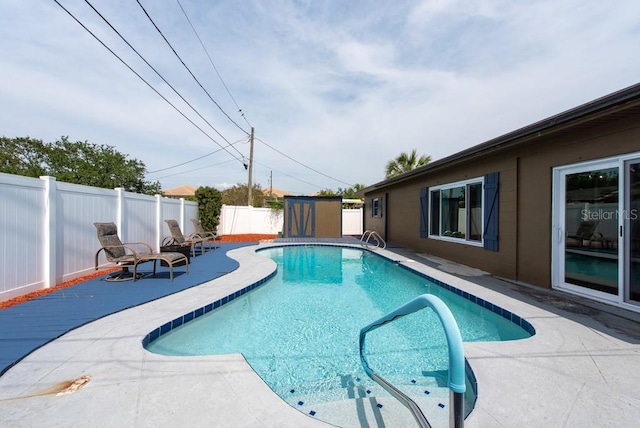 8305 75th Pl, Seminole, FL 33777 - view of pool featuring a fenced backyard and a patio
