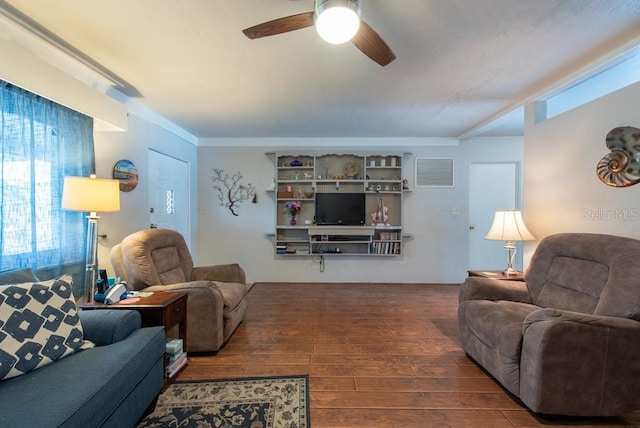 8305 75th Pl, Seminole, FL 33777 - living area featuring a ceiling fan, wood-type flooring, and plenty of natural light