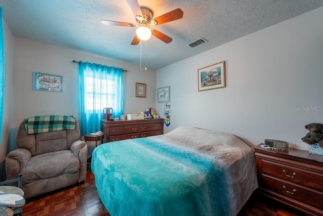 8305 75th Pl, Seminole, FL 33777 - bedroom featuring a textured ceiling and ceiling fan