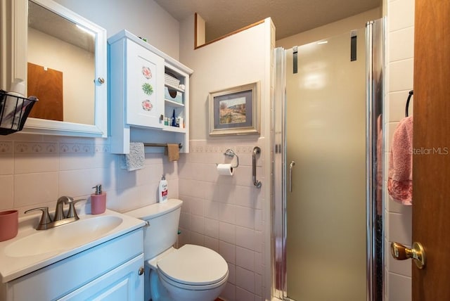 8305 75th Pl, Seminole, FL 33777 - bathroom with a stall shower, tile walls, toilet, and vanity