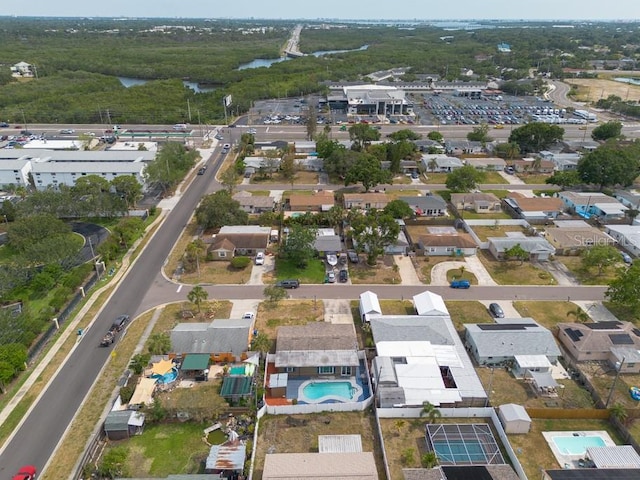 8305 75th Pl, Seminole, FL 33777 - aerial overview of property's location with a pool area and a large body of water