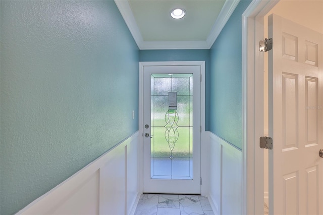 10922 Park Dr, Riverview, FL 33569 - doorway to outside featuring light marble finish floors, ornamental molding, wainscoting, and a textured wall