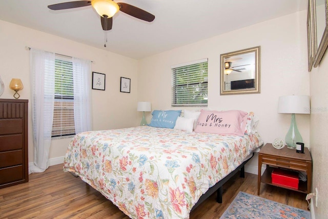 351 Hancock St, Dunedin, FL 34698 - bedroom featuring wood finished floors and a ceiling fan