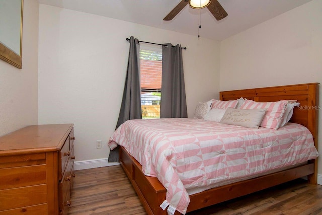 351 Hancock St, Dunedin, FL 34698 - bedroom featuring wood finished floors and ceiling fan