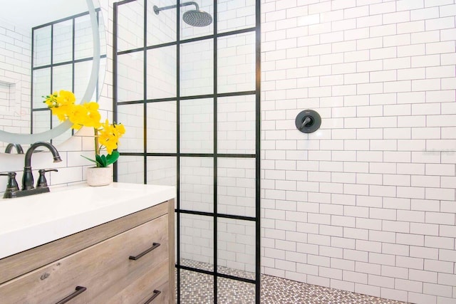 351 Hancock St, Dunedin, FL 34698 - bathroom featuring tiled shower and vanity