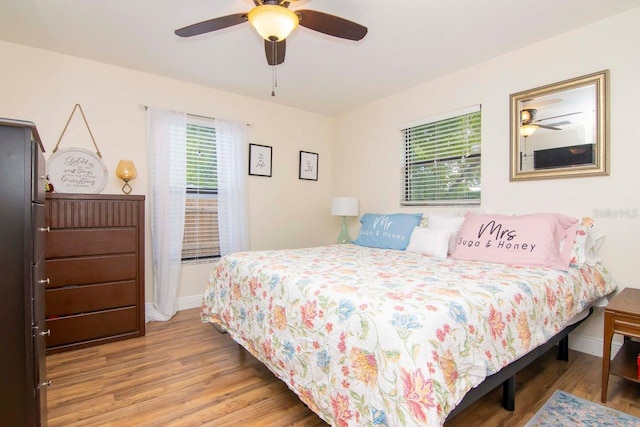 351 Hancock St, Dunedin, FL 34698 - bedroom featuring wood finished floors and ceiling fan