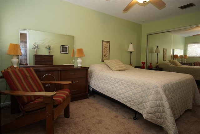 8011 Peach Dr Unit 103, Tampa, FL 33637 - carpeted bedroom with a closet and ceiling fan