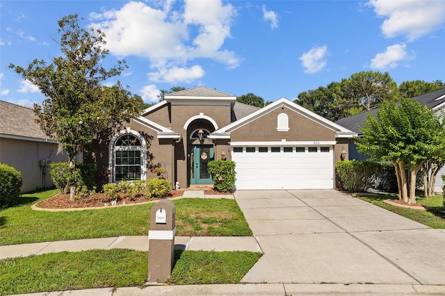18631 Le Dauphine Pl, Lutz, FL 33558 - view of front facade with a garage, a front lawn, driveway, and stucco siding