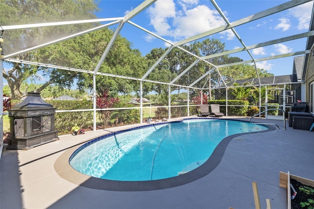 18631 Le Dauphine Pl, Lutz, FL 33558 - swimming pool with a patio and a fireplace