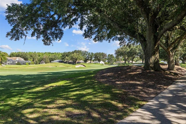 18631 Le Dauphine Pl, Lutz, FL 33558 - view of property's community featuring a yard and view of golf course