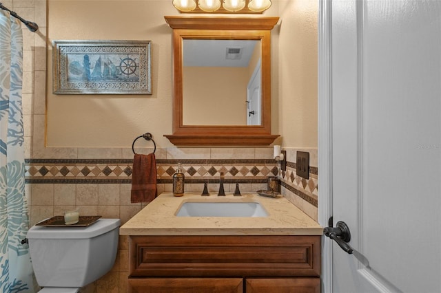 18631 Le Dauphine Pl, Lutz, FL 33558 - bathroom featuring tile walls, vanity, toilet, and a shower with curtain