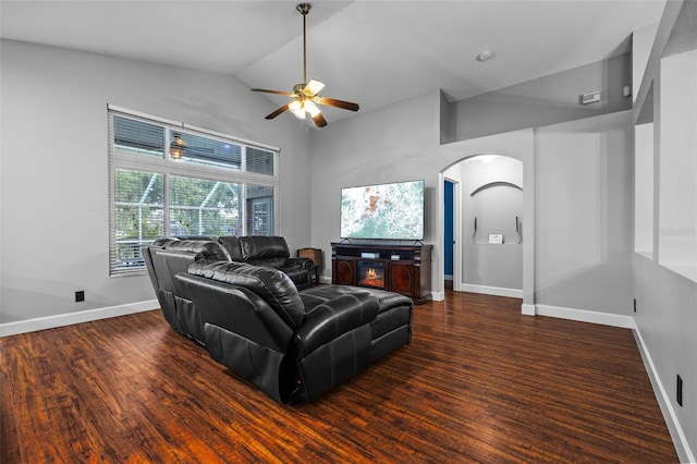 18631 Le Dauphine Pl, Lutz, FL 33558 - living area featuring arched walkways, a ceiling fan, baseboards, high vaulted ceiling, and wood finished floors