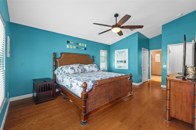18631 Le Dauphine Pl, Lutz, FL 33558 - bedroom featuring baseboards, lofted ceiling, wood finished floors, and ceiling fan