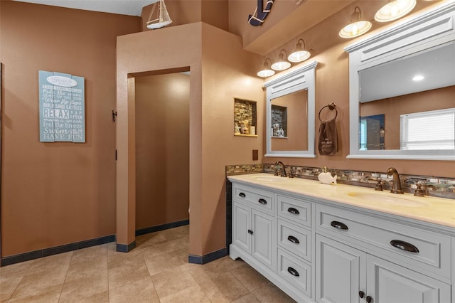 18631 Le Dauphine Pl, Lutz, FL 33558 - full bath featuring double vanity, baseboards, and tile patterned flooring