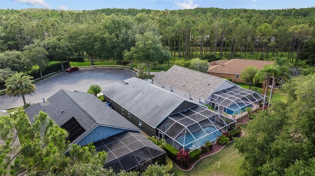 18631 Le Dauphine Pl, Lutz, FL 33558 - view of subject property with a heavily wooded area