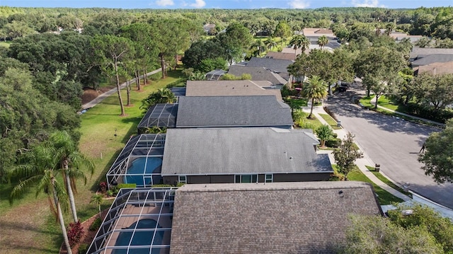 18631 Le Dauphine Pl, Lutz, FL 33558 - view from above of property with a heavily wooded area