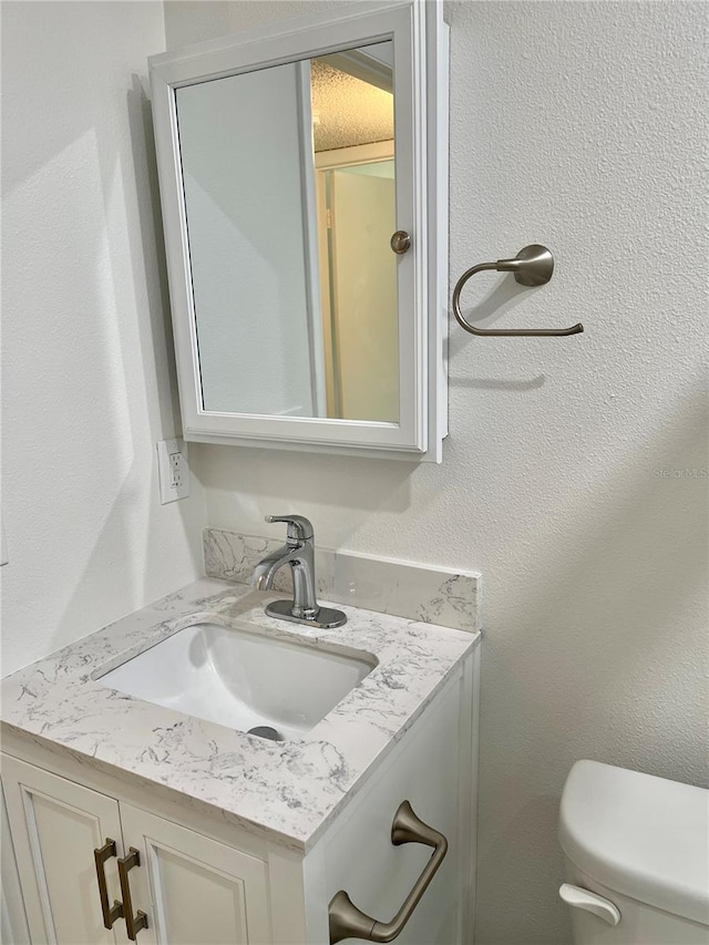 2293 Swedish Dr Unit 11, Clearwater, FL 33763 - half bath featuring vanity and toilet