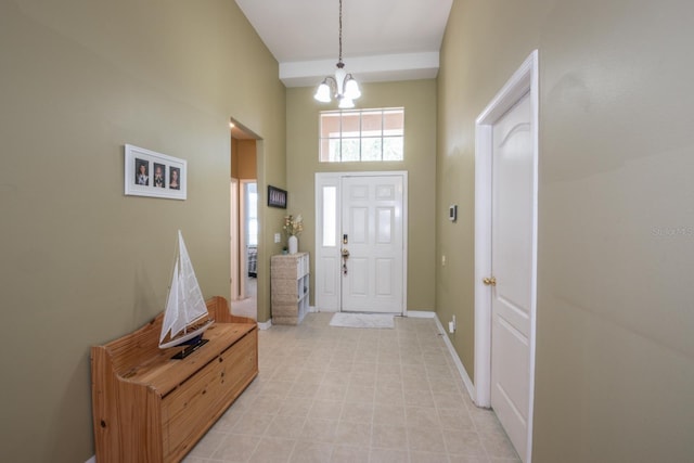 11021 Silver Dancer Dr, Riverview, FL 33579 - entryway featuring a chandelier and baseboards
