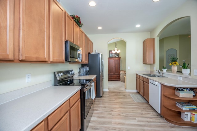 11021 Silver Dancer Dr, Riverview, FL 33579 - kitchen with electric range, stainless steel microwave, a sink, dishwasher, and light wood-type flooring