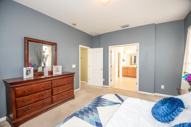 11021 Silver Dancer Dr, Riverview, FL 33579 - bedroom featuring light carpet, baseboards, and ensuite bathroom