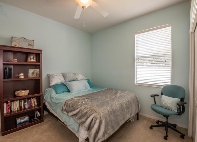 11021 Silver Dancer Dr, Riverview, FL 33579 - bedroom with carpet flooring, multiple windows, baseboards, and a ceiling fan