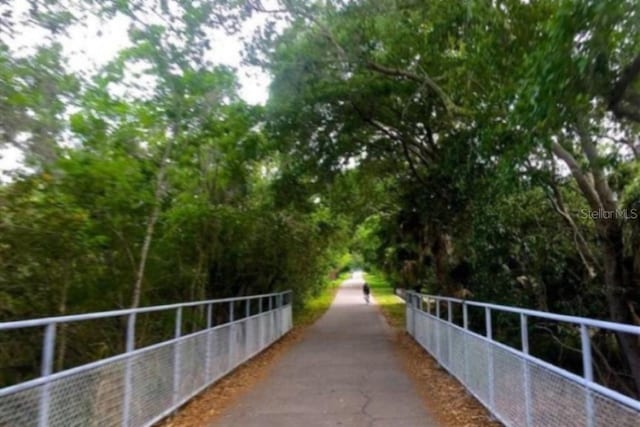 view of home's community with fence