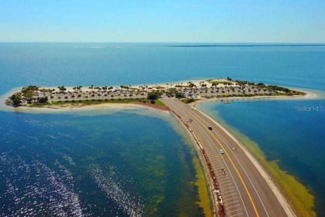 aerial view of a large body of water and a major roadway