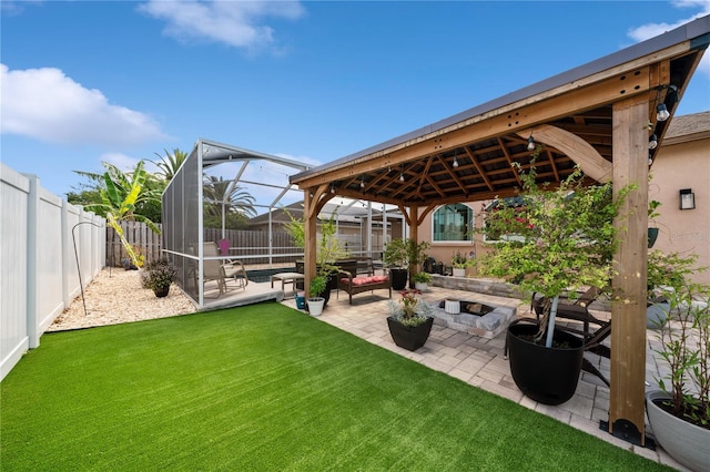 view of yard featuring a patio, a gazebo, and a lanai