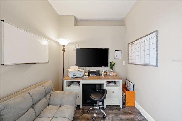 office space featuring dark wood-type flooring and baseboards