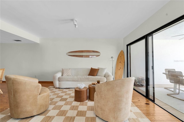 3200 Gulf Blvd Unit 202, St Pete Beach, FL 33706 - living room with light wood finished floors