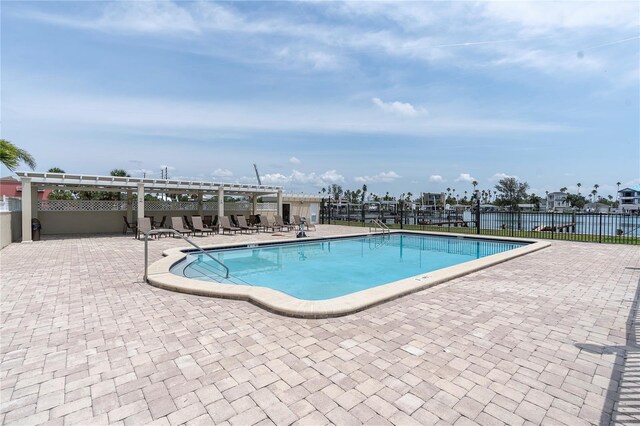 3200 Gulf Blvd Unit 202, St Pete Beach, FL 33706 - community pool with a pergola, fence, and a patio