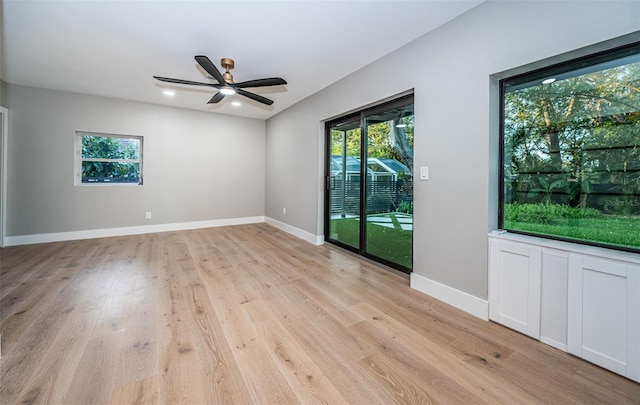 unfurnished room featuring ceiling fan, light wood-type flooring, baseboards, and recessed lighting