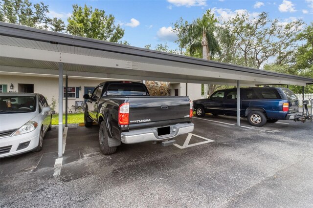 9821 113th St Unit 201, Seminole, FL 33772 - view of covered parking lot