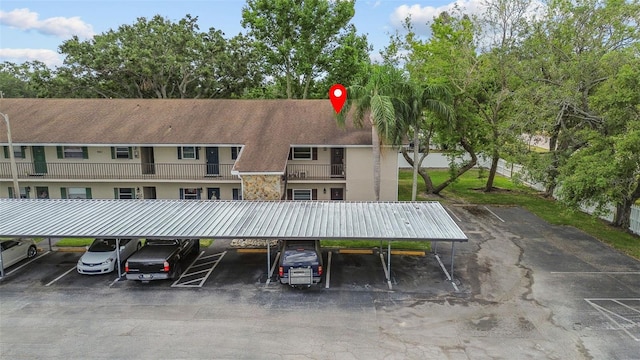 9821 113th St Unit 201, Seminole, FL 33772 - view of covered parking lot