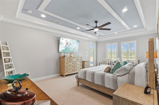 21642 Emory Oak Pl, Land O Lakes, FL 34637 - bedroom with a raised ceiling, crown molding, recessed lighting, light colored carpet, and a ceiling fan