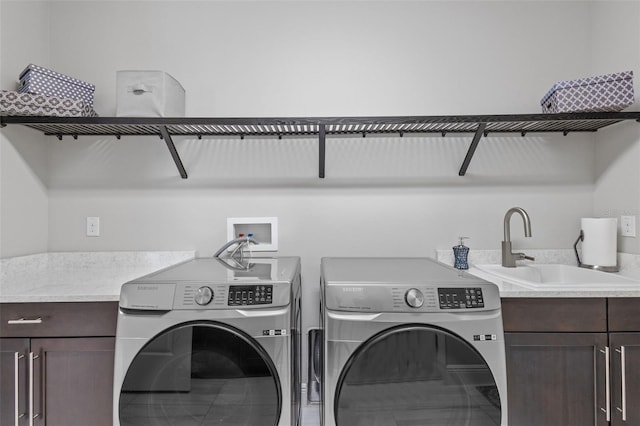 21642 Emory Oak Pl, Land O Lakes, FL 34637 - washroom with washer and dryer and cabinet space