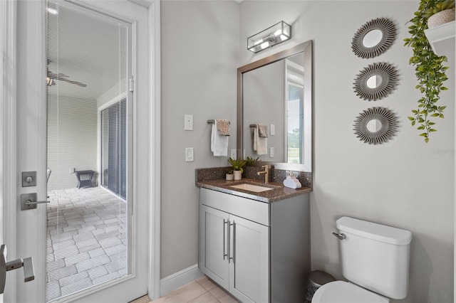 21642 Emory Oak Pl, Land O Lakes, FL 34637 - bathroom with vanity, toilet, and tile patterned flooring