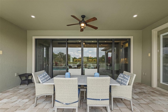 21642 Emory Oak Pl, Land O Lakes, FL 34637 - view of patio / terrace with ceiling fan and outdoor dining area