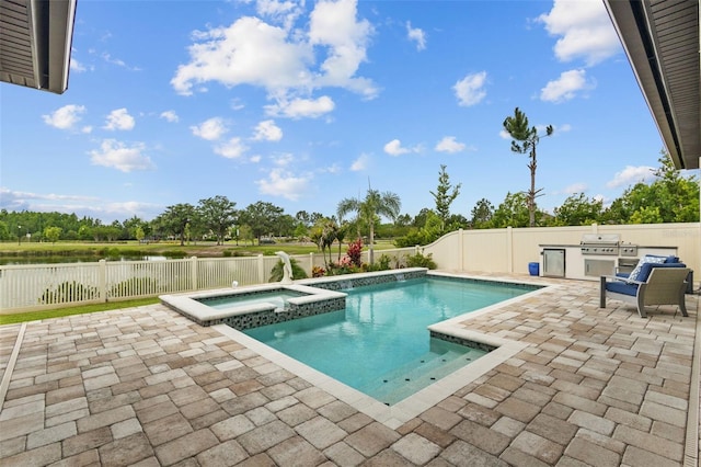 21642 Emory Oak Pl, Land O Lakes, FL 34637 - view of swimming pool featuring a patio area, a fenced backyard, a water view, and a pool with connected hot tub