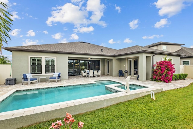 21642 Emory Oak Pl, Land O Lakes, FL 34637 - back of house with french doors, stucco siding, a patio area, a pool with connected hot tub, and a shingled roof