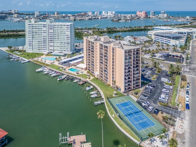 view of urban area with a large body of water and apartment complex / building