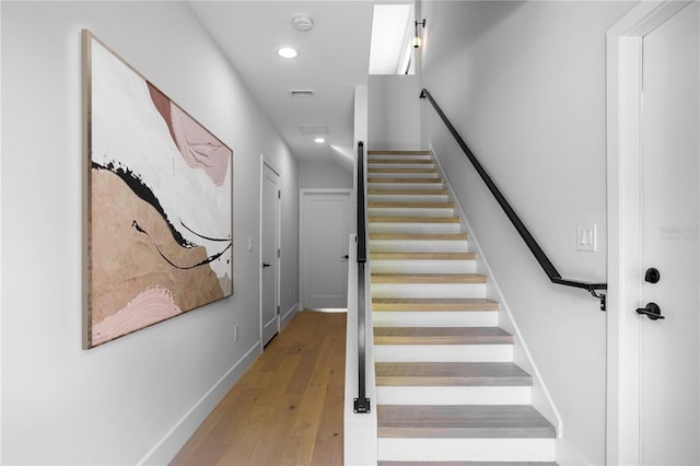607 W Euclid Ave Unit 3, Tampa, FL 33602 - staircase featuring recessed lighting, wood finished floors, and baseboards