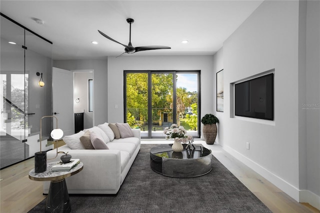 607 W Euclid Ave Unit 3, Tampa, FL 33602 - living room with recessed lighting, ceiling fan, wood finished floors, and baseboards