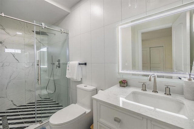 5744 150th Ave N, Clearwater, FL 33760 - bathroom featuring toilet, vanity, a marble finish shower, and tile walls